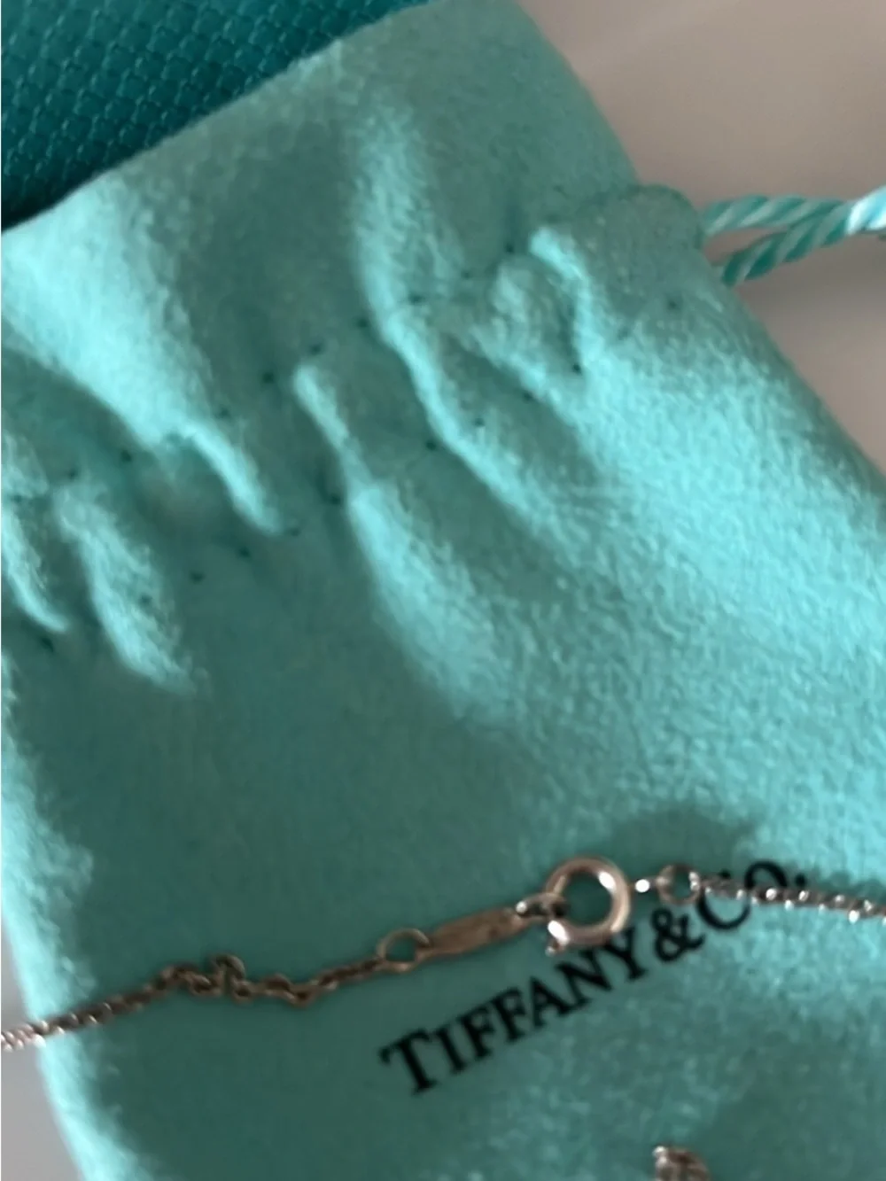 Tiffany & Co. Retired Sterling, silver hibiscus pendant necklace.
